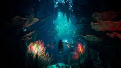 Official AION 2 screenshot of a party fighting inside a glowing teal cavern